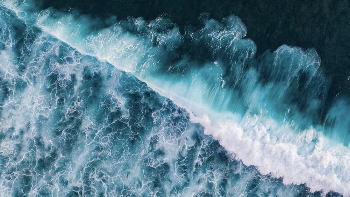 Drone photographs of salty sea water crashing on a beach (Getty Images). 