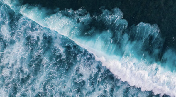 Drone photographs of salty sea water crashing on a beach (Getty Images). 